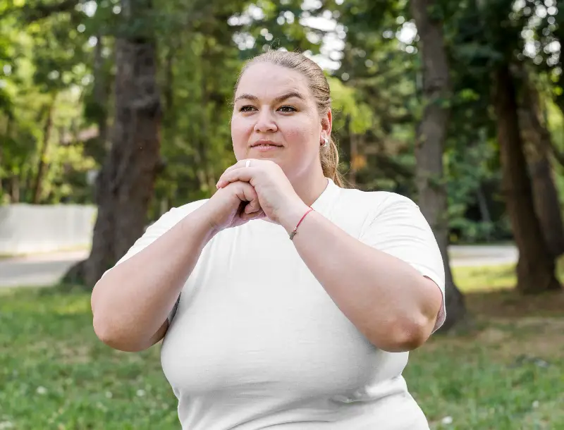 Woman exercising in a park